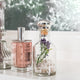 Vanity with bottles evoking YSL Libre Intense and Phlur Golden Rule